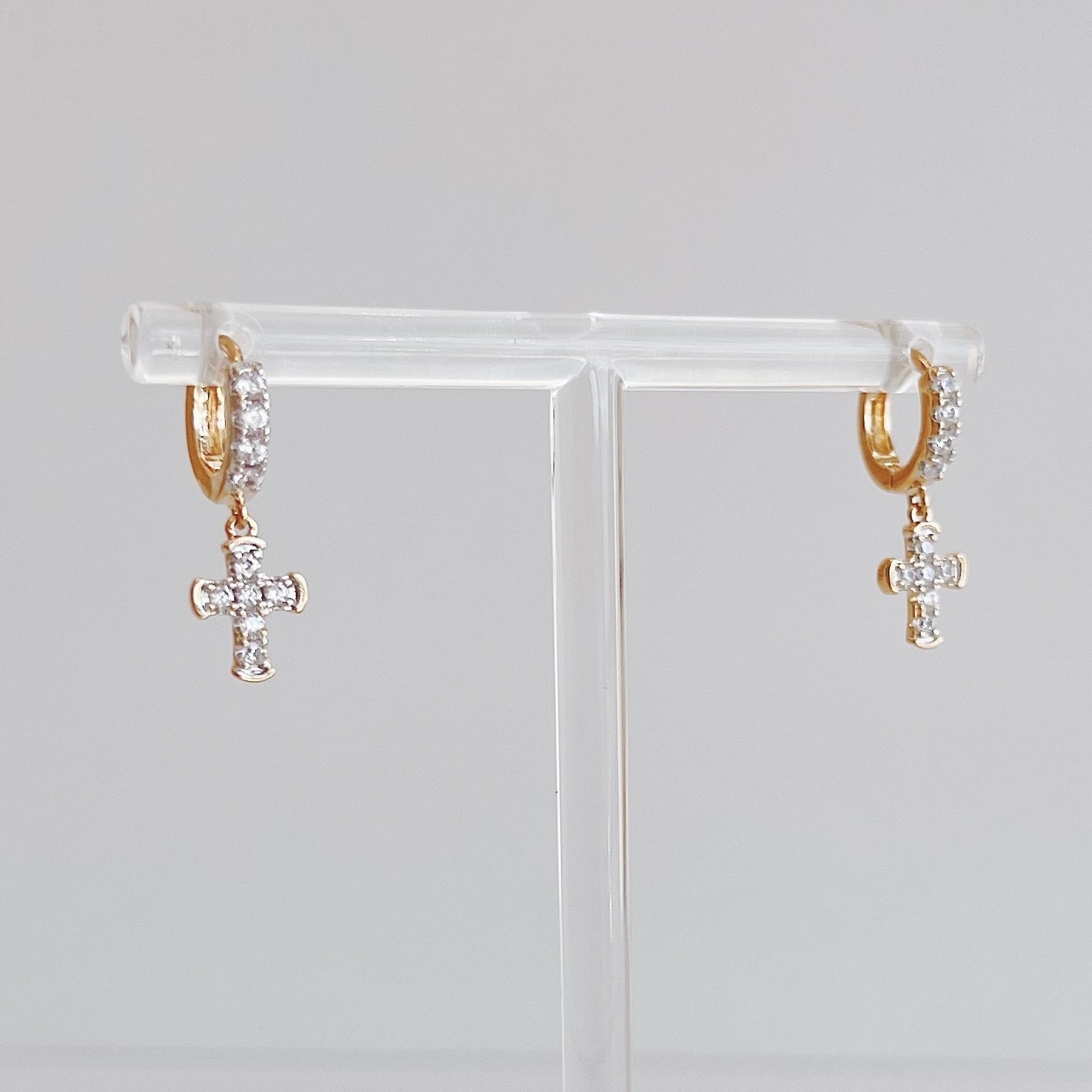 HUGGIE CRUZ COLGANTE