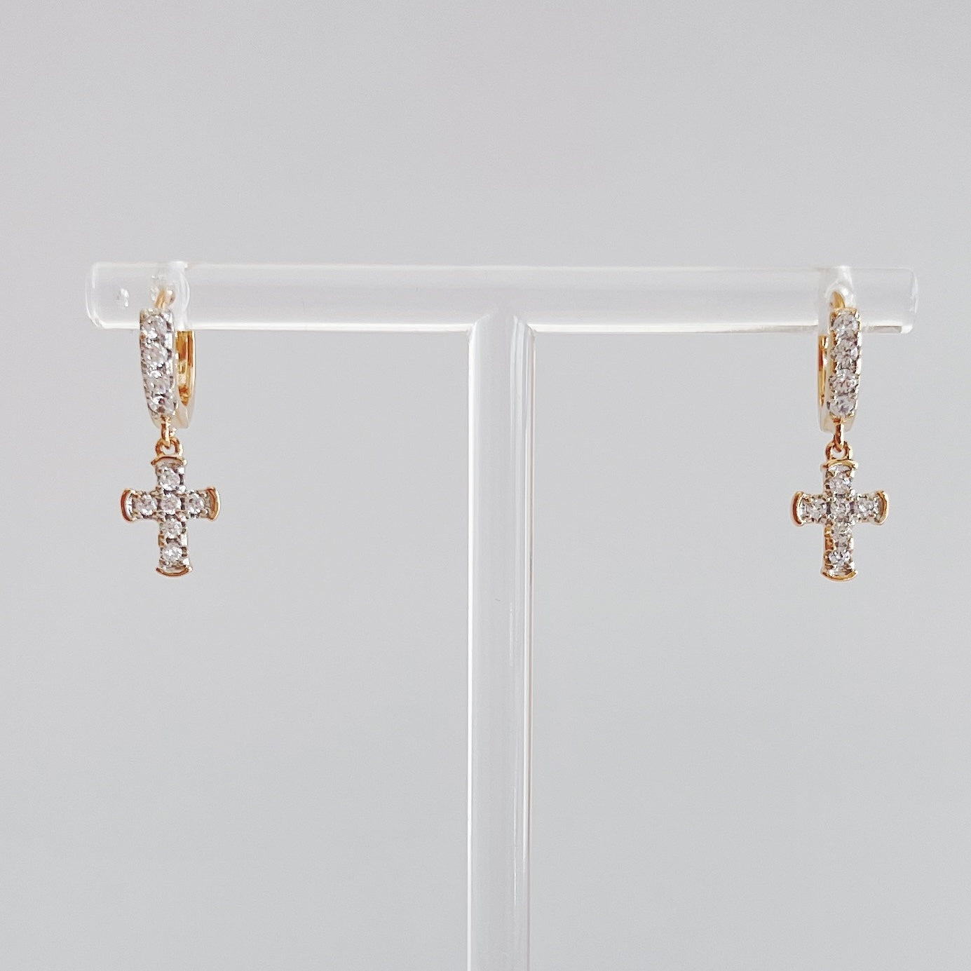 HUGGIE CRUZ COLGANTE